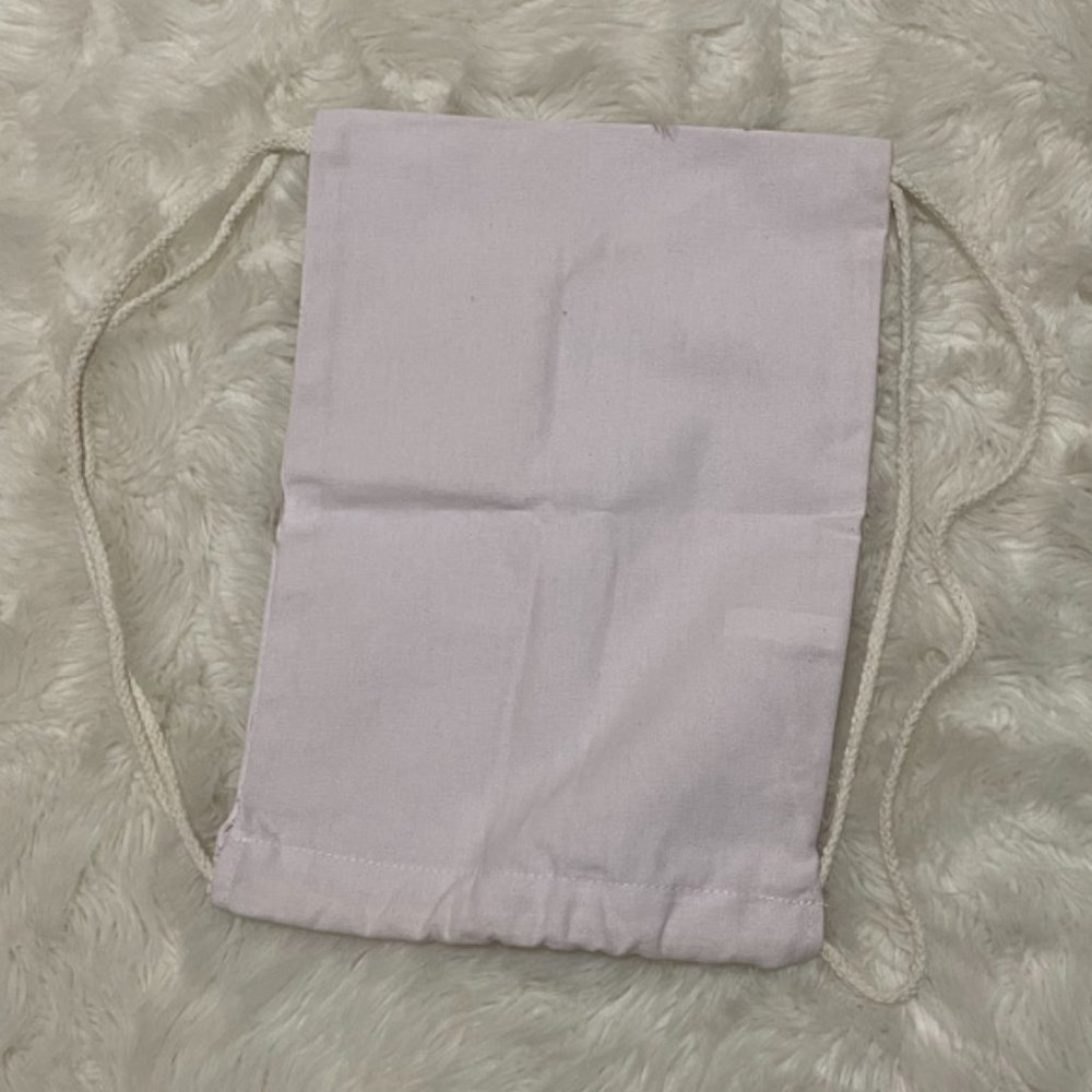 White cloth wine bottle pouch, side drawstring straps